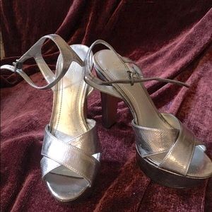 BCBGeneration silver ankle-strap platform heels size 7